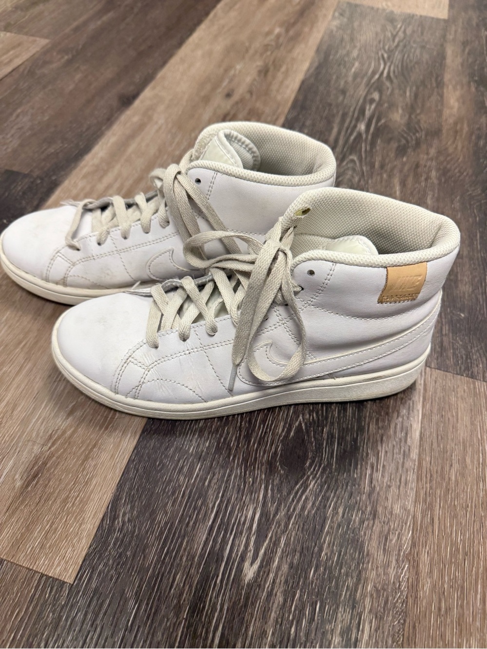 Nike White High-Top Sneakers with Tan Heel Patch